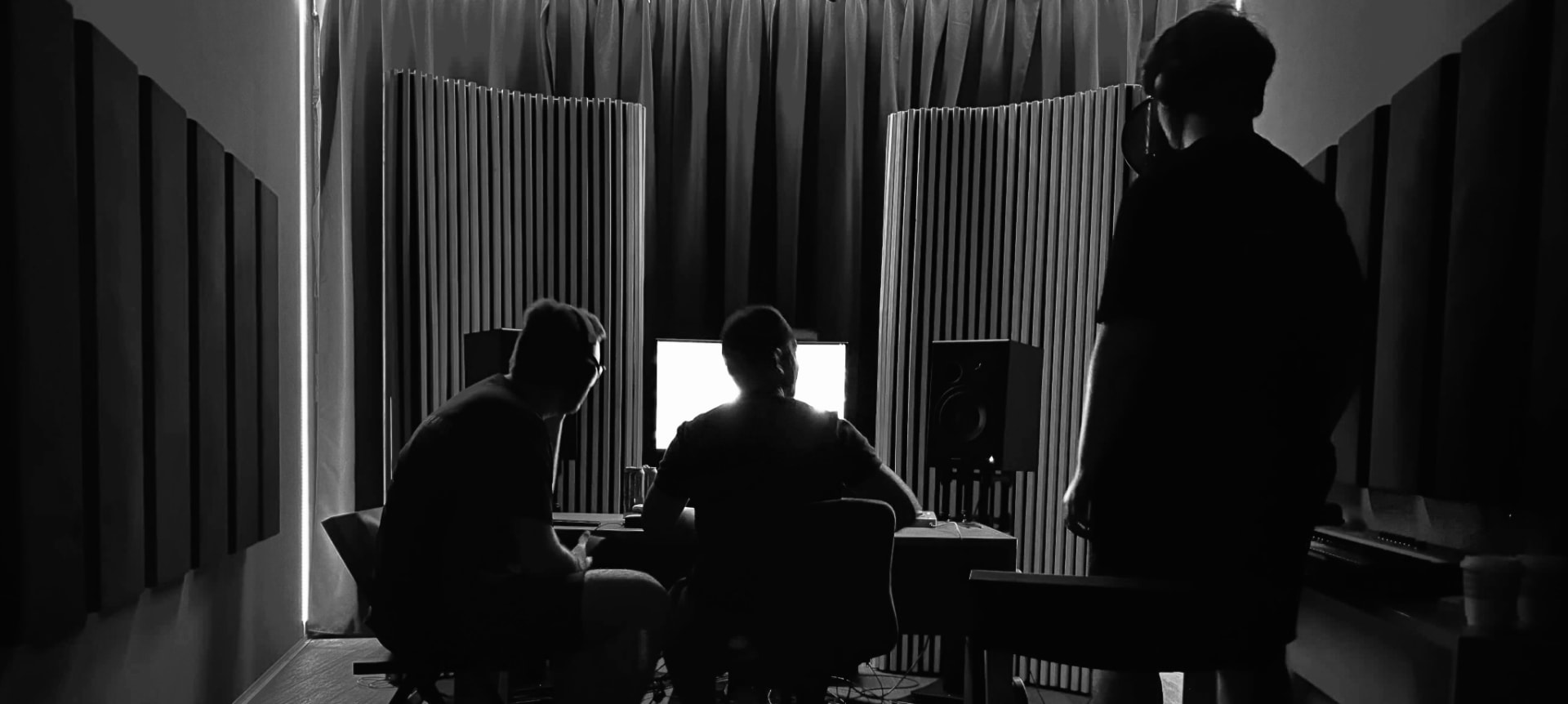 28TH DISTRICT recording session in a dark studio